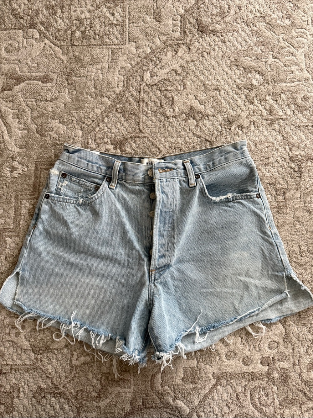 AGOLDE High-Rise Light Blue Denim Shorts with Raw Hem